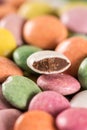 Colorful round chocolate candies closeup macro sliced candy