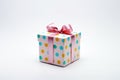 colorful round dot giftbox with pink ribbon, gift box present for special occasion, ai generated Royalty Free Stock Photo