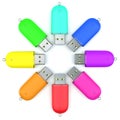 Colorful round pendrives on white background Royalty Free Stock Photo