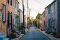 Colorful row houses along Chapel Street in Butchers Hill, Baltimore, Maryland