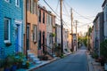 Colorful row houses along Chapel Street in Butchers Hill, Baltimore, Maryland