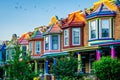 Colorful row houses on Guilford Avenue, in Charles Village, Baltimore, Maryland