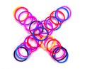 Colorful rubber band multiply symbol. Royalty Free Stock Photo