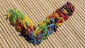 Colorful Rubber Bands on Bamboo Mat Royalty Free Stock Photo