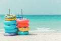 Colorful rubber ring on white sand beach Royalty Free Stock Photo