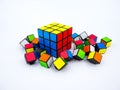 Colorful Rubik's cube and broken cube pieces