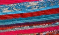 Colorful rug surface close up vintage fabric is made of hand-woven cotton fabric.Display in bazaar,details