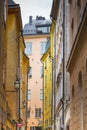 Colorful rustic Alley with Cobblestone road Royalty Free Stock Photo