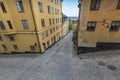 Colorful rustic Alley with Cobblestone road with a surrealistic Royalty Free Stock Photo