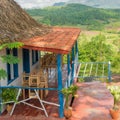 Colorful rustic wooden house at the Vinales Valley