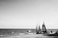 Colorful sailboat on tropical beach in summer.