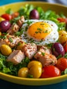 Colorful salad with chicken, fried egg, and vegetables. Royalty Free Stock Photo
