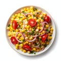 A colorful salad with corn kernels, cherry tomatoes, and red onions Royalty Free Stock Photo