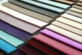 Colorful samples of upholstery fabrics, close-up Royalty Free Stock Photo