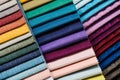Colorful samples of upholstery fabrics close-up. Leather and suede for furniture Royalty Free Stock Photo