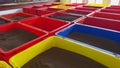 Colorful sand containers. Action. Colorful sand containers stored in warehouse in southern country. Sand in containers