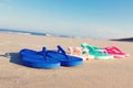 Colorful sandals at the beach Royalty Free Stock Photo