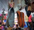 Colorful sandals hanging in the shop to attract the customer for sale.