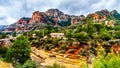 The colorful sandstone mountains and canyon carved by Oak Creek at famous Slide Rock State Park along Arizona SR89A Royalty Free Stock Photo