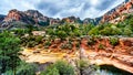 The colorful sandstone mountains and canyon carved by Oak Creek at famous Slide Rock State Park along Arizona SR89A Royalty Free Stock Photo