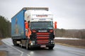 Colorful Scania V8 Semi Trailer Truck on Rural Road