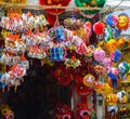 Colorful scene, friendly vendor on Hang Ma lantern street, lantern at open air market, traditional culture on mid autumn, Vietnam Royalty Free Stock Photo