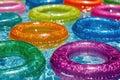 A colorful scene of inflatables floating in a pool, great for summer fun and games Royalty Free Stock Photo