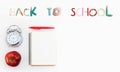 Colorful school supplies corner border over a white background with words Back to school Royalty Free Stock Photo