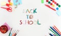 Colorful school supplies corner border over a white background with words Back to school Royalty Free Stock Photo