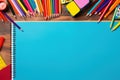 Colorful school supplies create a double border on lined paper background in this illustration Royalty Free Stock Photo