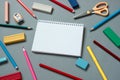 Colorful School Supplies Scattered Around Notebook Royalty Free Stock Photo