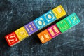 Colorful School time word from wooden blocks Royalty Free Stock Photo