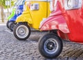 Colorful scooters in a row