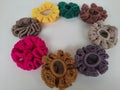 Colorful scrunchies on a plain white background