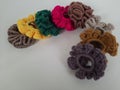 Colorful scrunchies on a plain white background