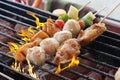 Colorful seafood skewers on the grill