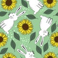 Colorful seamless pattern with bunnies, sunflowers, leaves. Decorative cute background with funny rabbits, garden. Animals, flower Royalty Free Stock Photo