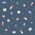 Colorful seamless pattern with different pills and capsules