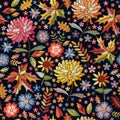 Colorful seamless pattern with embroidered flowers and leaves. Bright embroidery design on black background Royalty Free Stock Photo