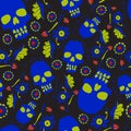 Colorful seamless pattern with flowers and skulls. Black background.