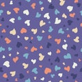 Colorful seamless pattern with heart confetti scattered in a mess.