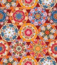 Colorful seamless pattern with ornamental mandalas. Print for fabric, textile, wrapping paper