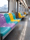 Colorful seats in an empty subway train. Royalty Free Stock Photo