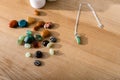 Colorful semiprecious stones on brown wooden surface