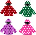 Set of kids raincoats with polka dot pattern vector