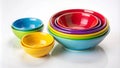 A colorful set of nesting bowls in various sizes and colors