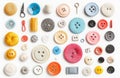 Colorful sewing accessories arranged on white surface, featuring buttons, thread spools, scissors creating neat craft workshop Royalty Free Stock Photo