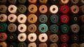 Colorful sewing thread spools overhead pattern Royalty Free Stock Photo