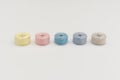 Colorful Sewing Thread Spools in a Row Royalty Free Stock Photo