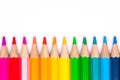 Colorful sharp bright pencils are a smooth line on a white background, a symbol of LGBT